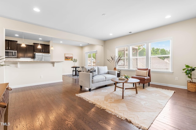 1104 Arden Trace Ct, Fuquay Varina, NC 27526 - living room with hardwood / wood-style flooring, baseboards, and recessed lighting