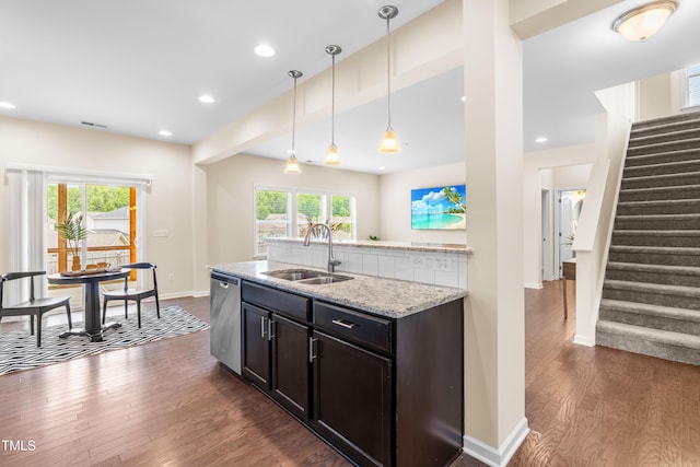 1104 Arden Trace Ct, Fuquay Varina, NC 27526 - kitchen featuring a sink, dishwasher, dark wood-style flooring, healthy amount of natural light, and recessed lighting