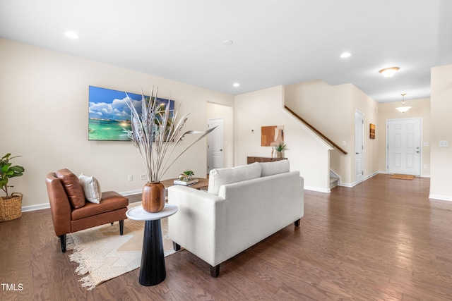 1104 Arden Trace Ct, Fuquay Varina, NC 27526 - living room featuring stairway, wood finished floors, baseboards, and recessed lighting
