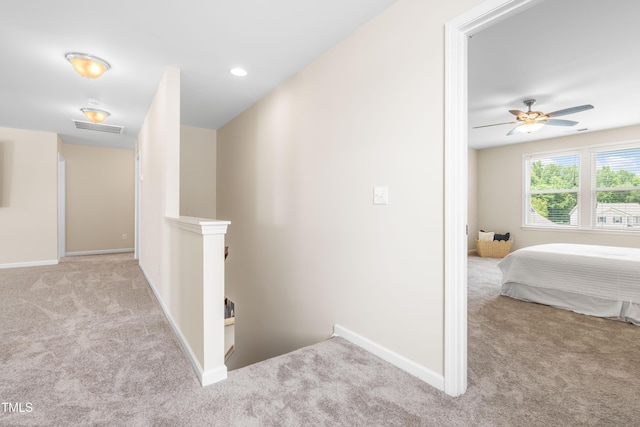 1104 Arden Trace Ct, Fuquay Varina, NC 27526 - hall featuring carpet flooring, an upstairs landing, and baseboards