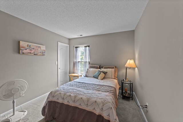 228 Honeywell Way, Fuquay Varina, NC 27526 - carpeted bedroom with baseboards, a textured ceiling, and visible vents