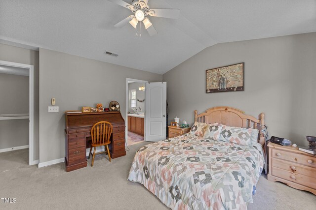 228 Honeywell Way, Fuquay Varina, NC 27526 - bedroom with ceiling fan, light colored carpet, baseboards, lofted ceiling, and visible vents