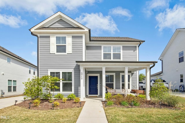 5009 Megara Run, Raleigh, NC 27603 - view of front of property with covered porch and a front yard