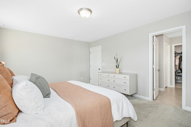 5009 Megara Run, Raleigh, NC 27603 - bedroom featuring light colored carpet and baseboards