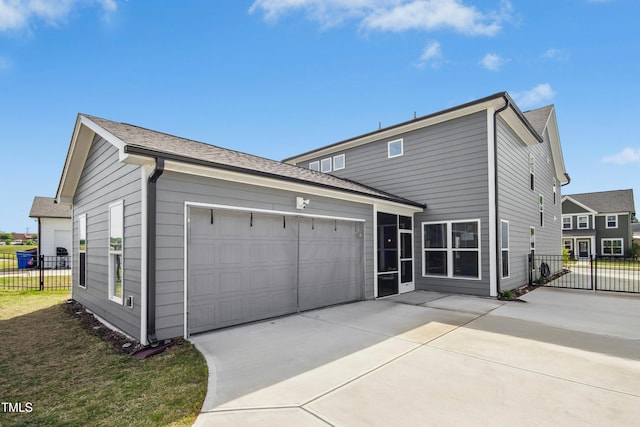 5009 Megara Run, Raleigh, NC 27603 - view of front of property featuring concrete driveway, a garage, and a shingled roof