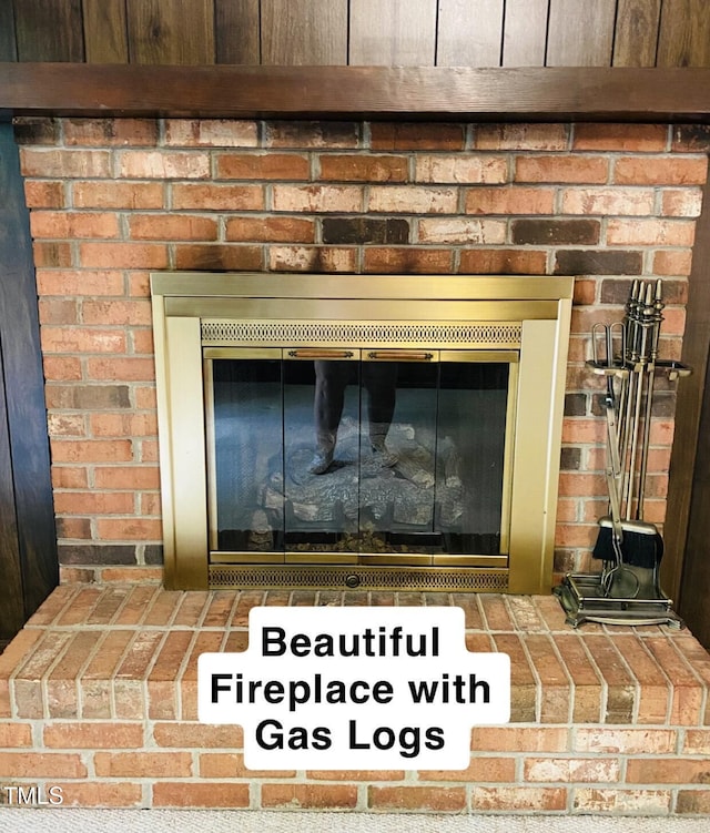interior details featuring a fireplace