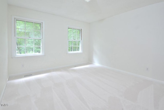 5825 Scalybark Rd, Durham, NC 27712 - unfurnished room featuring carpet floors and baseboards