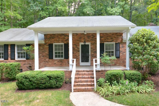 5825 Scalybark Rd, Durham, NC 27712 - ranch-style home with covered porch and brick siding