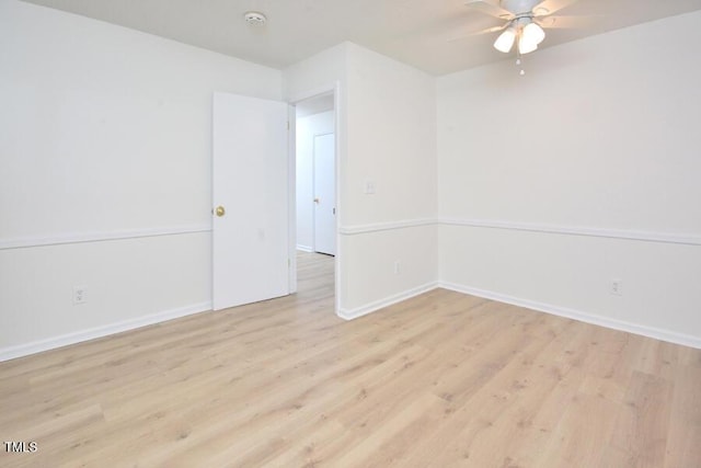 5825 Scalybark Rd, Durham, NC 27712 - empty room with wood finished floors, ceiling fan, and a smoke detector