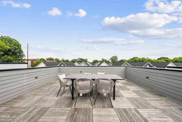 deck featuring outdoor dining area