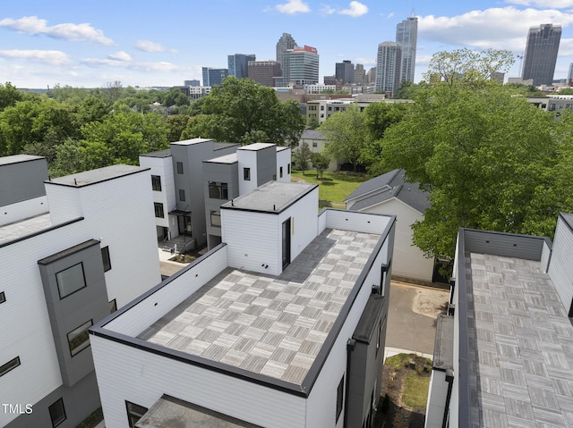 birds eye view of property with a city view