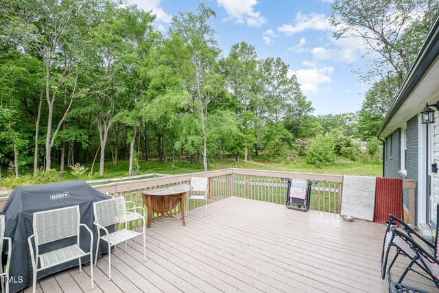 553 Isley Rd, Haw River, NC 27258 - wooden terrace featuring area for grilling and view of wooded area