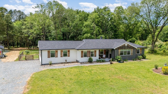 553 Isley Rd, Haw River, NC 27258 - ranch-style house with gravel driveway and a front yard