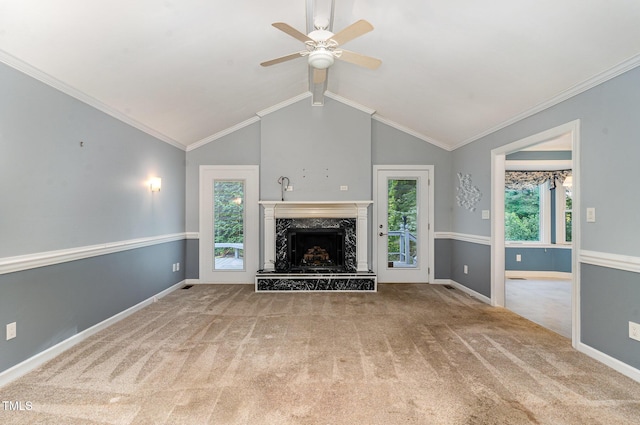unfurnished living room featuring baseboards, ceiling fan, lofted ceiling with beams, a high end fireplace, and carpet flooring