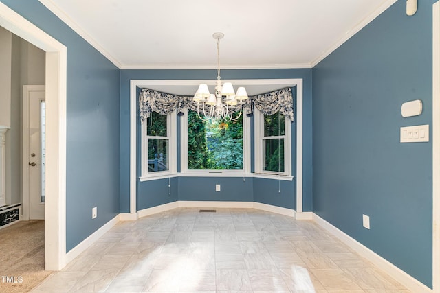 unfurnished dining area featuring baseboards, ornamental molding, visible vents, and a chandelier
