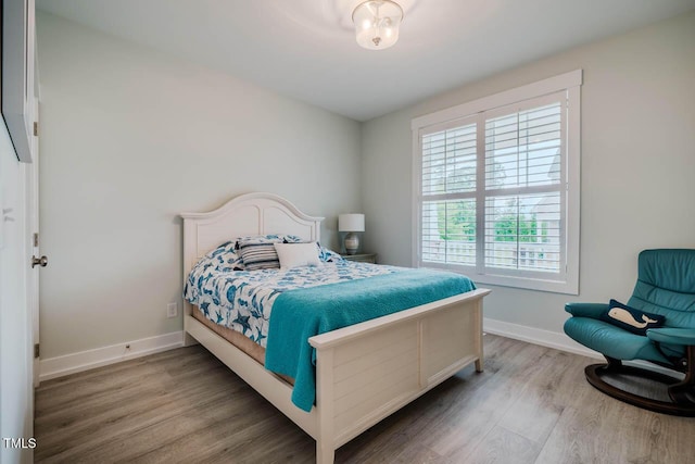 328 Boone St, Chapel Hill, NC 27516 - bedroom featuring wood finished floors and baseboards