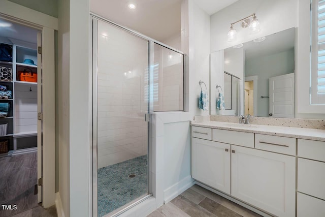 328 Boone St, Chapel Hill, NC 27516 - full bath with a stall shower, wood finished floors, and vanity