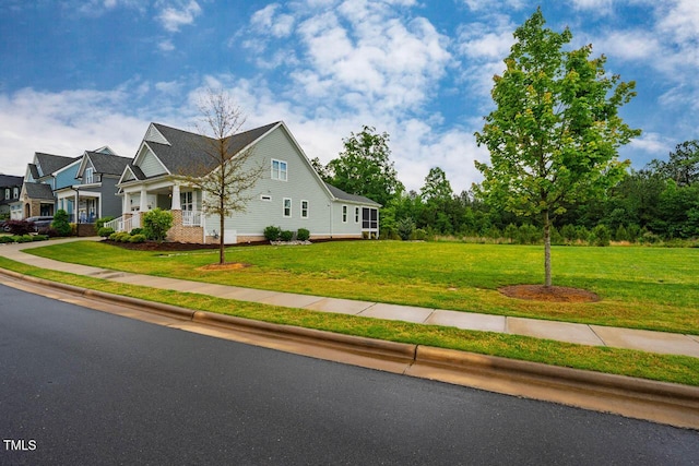 328 Boone St, Chapel Hill, NC 27516 - view of front facade featuring a front lawn