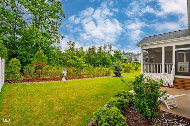 328 Boone St, Chapel Hill, NC 27516 - view of green lawn with a sunroom and a patio area