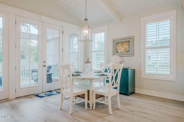 328 Boone St, Chapel Hill, NC 27516 - dining room featuring a chandelier, light wood finished floors, french doors, wood ceiling, and baseboards