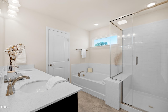 full bath featuring a sink, a shower stall, and a bath