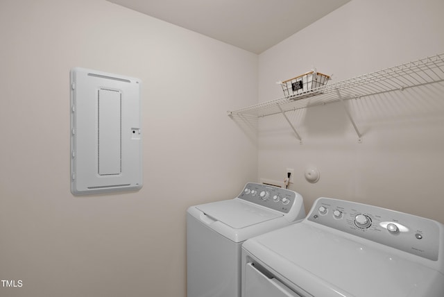 washroom with laundry area and washer and dryer