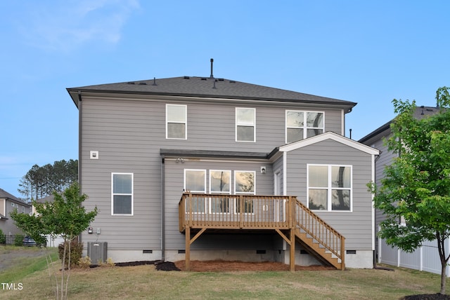 rear view of property with crawl space, a wooden deck, central AC, fence, and stairs