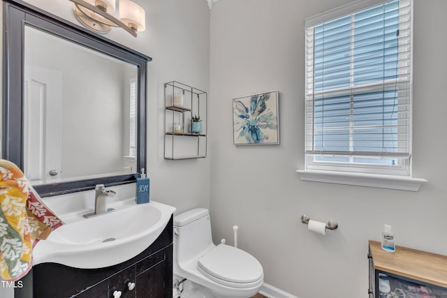 312 Grassy Point Rd, Apex, NC 27502 - half bath with toilet, vanity, and baseboards
