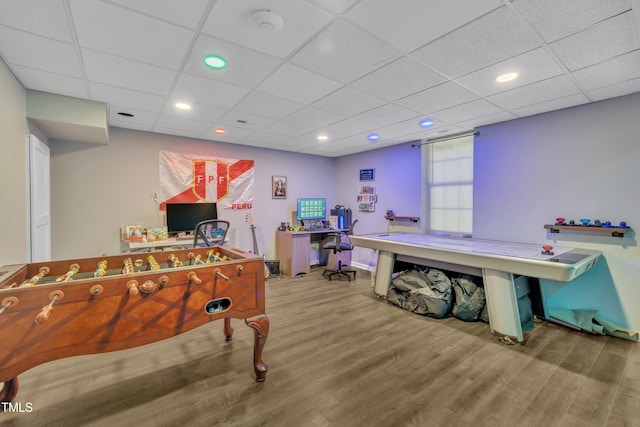 312 Grassy Point Rd, Apex, NC 27502 - game room featuring wood finished floors, a drop ceiling, recessed lighting, and baseboards