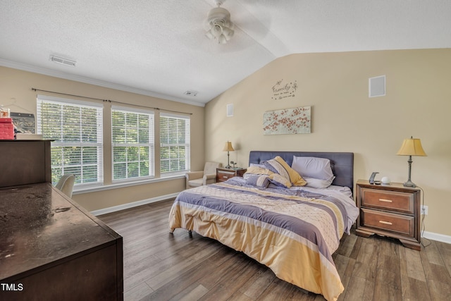 312 Grassy Point Rd, Apex, NC 27502 - bedroom with wood finished floors, vaulted ceiling, baseboards, and ceiling fan