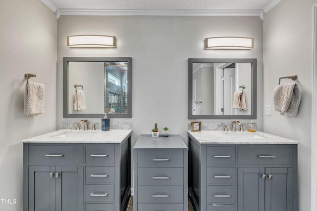 312 Grassy Point Rd, Apex, NC 27502 - bathroom featuring two vanities and ornamental molding