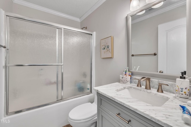 312 Grassy Point Rd, Apex, NC 27502 - bathroom featuring ornamental molding, vanity, toilet, combined bath / shower with glass door, and a textured ceiling