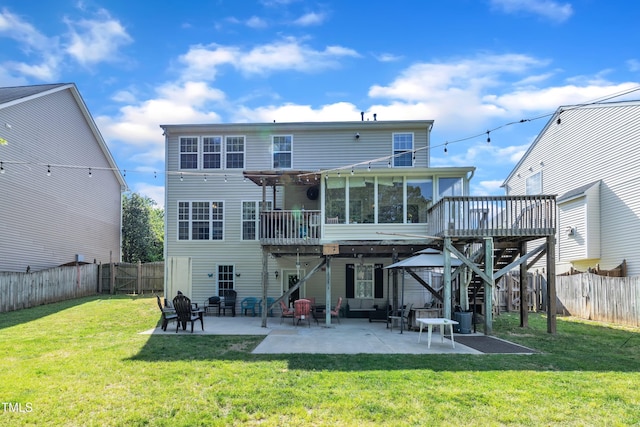 312 Grassy Point Rd, Apex, NC 27502 - rear view of property with a patio, a deck, and a sunroom