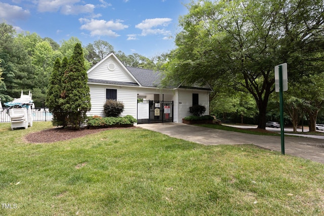 312 Grassy Point Rd, Apex, NC 27502 - ranch-style home with a gate and a shingled roof