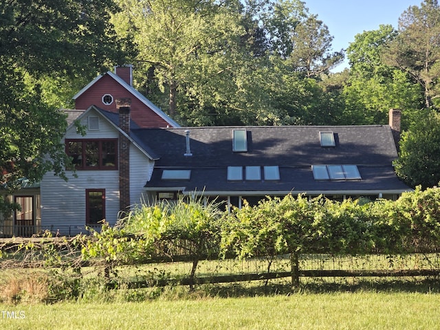 view of front of house with a chimney