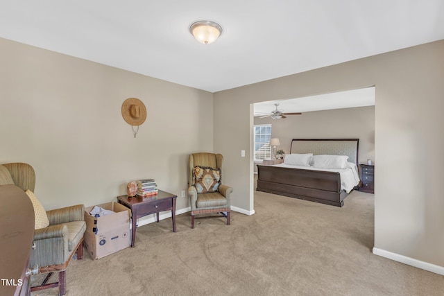 bedroom with carpet floors and baseboards