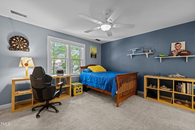 bedroom with carpet, ceiling fan, and baseboards