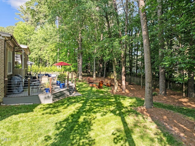 view of yard featuring a deck