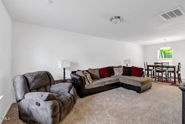 carpeted living room featuring visible vents