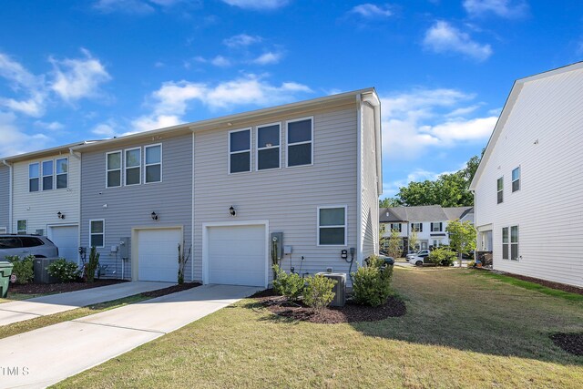 162 Channel Drop Dr, Clayton, NC 27520 - exterior space with a lawn, driveway, and a garage