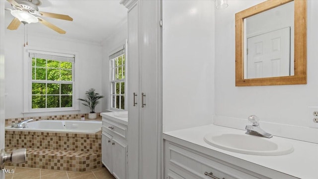 bathroom with ceiling fan, tile patterned flooring, a garden tub, vanity, and crown molding