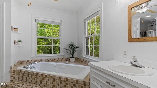 full bathroom featuring vanity, ornamental molding, a bath, and ceiling fan