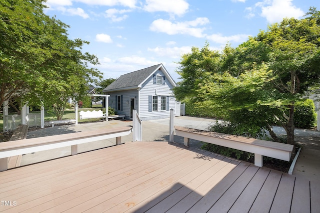 deck with an outbuilding