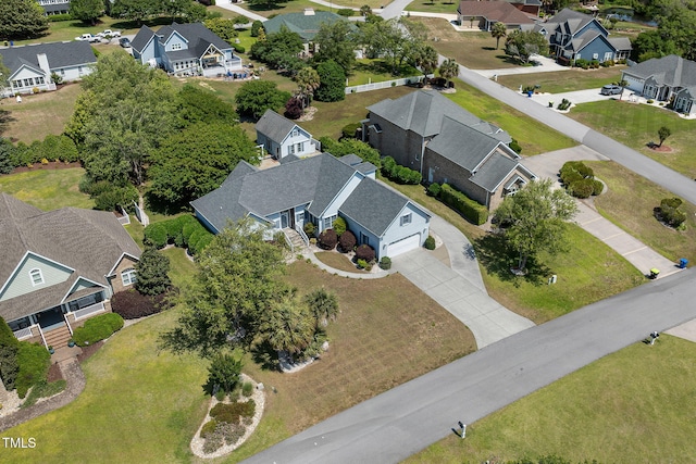 aerial view of property's location with nearby suburban area