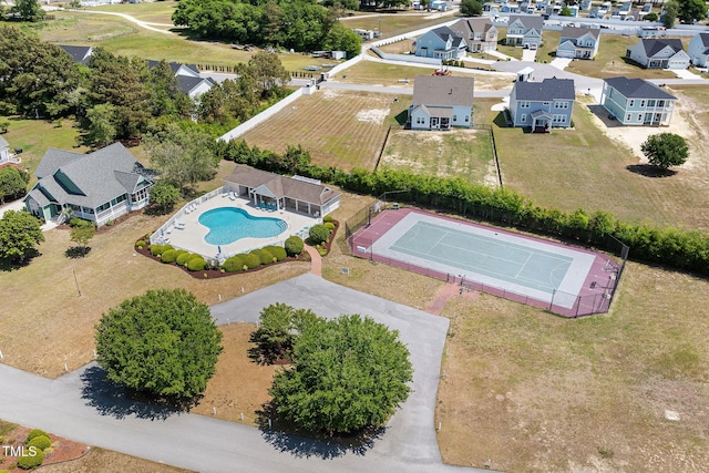 aerial view of residential area featuring a pool area