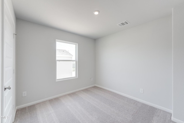 124 Landon Pl, Roxboro, NC 27573 - empty room with carpet floors, baseboards, and visible vents
