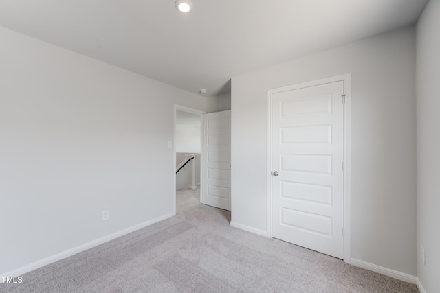 124 Landon Pl, Roxboro, NC 27573 - unfurnished bedroom featuring recessed lighting, baseboards, and carpet