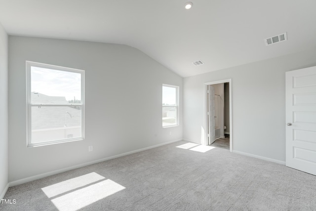 124 Landon Pl, Roxboro, NC 27573 - unfurnished bedroom with carpet floors, baseboards, visible vents, and lofted ceiling