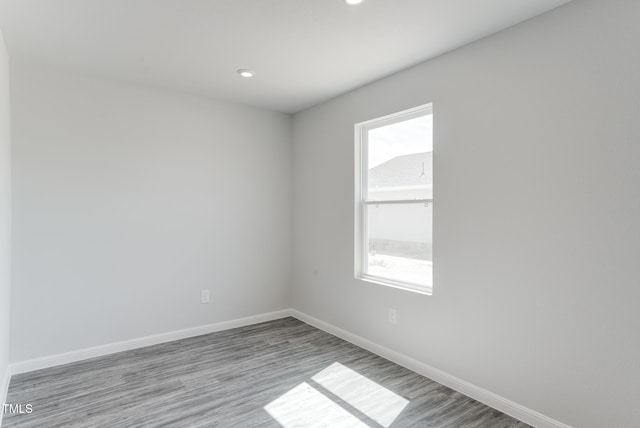 124 Landon Pl, Roxboro, NC 27573 - unfurnished room with recessed lighting, baseboards, and wood finished floors