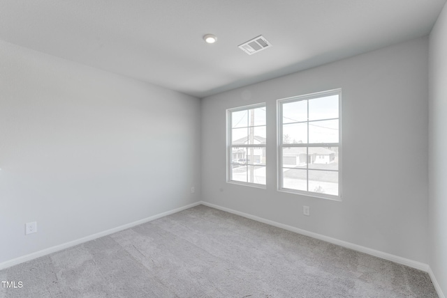 124 Landon Pl, Roxboro, NC 27573 - empty room featuring carpet flooring, baseboards, and visible vents